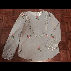 Blouse with blue and white stripe and flowers